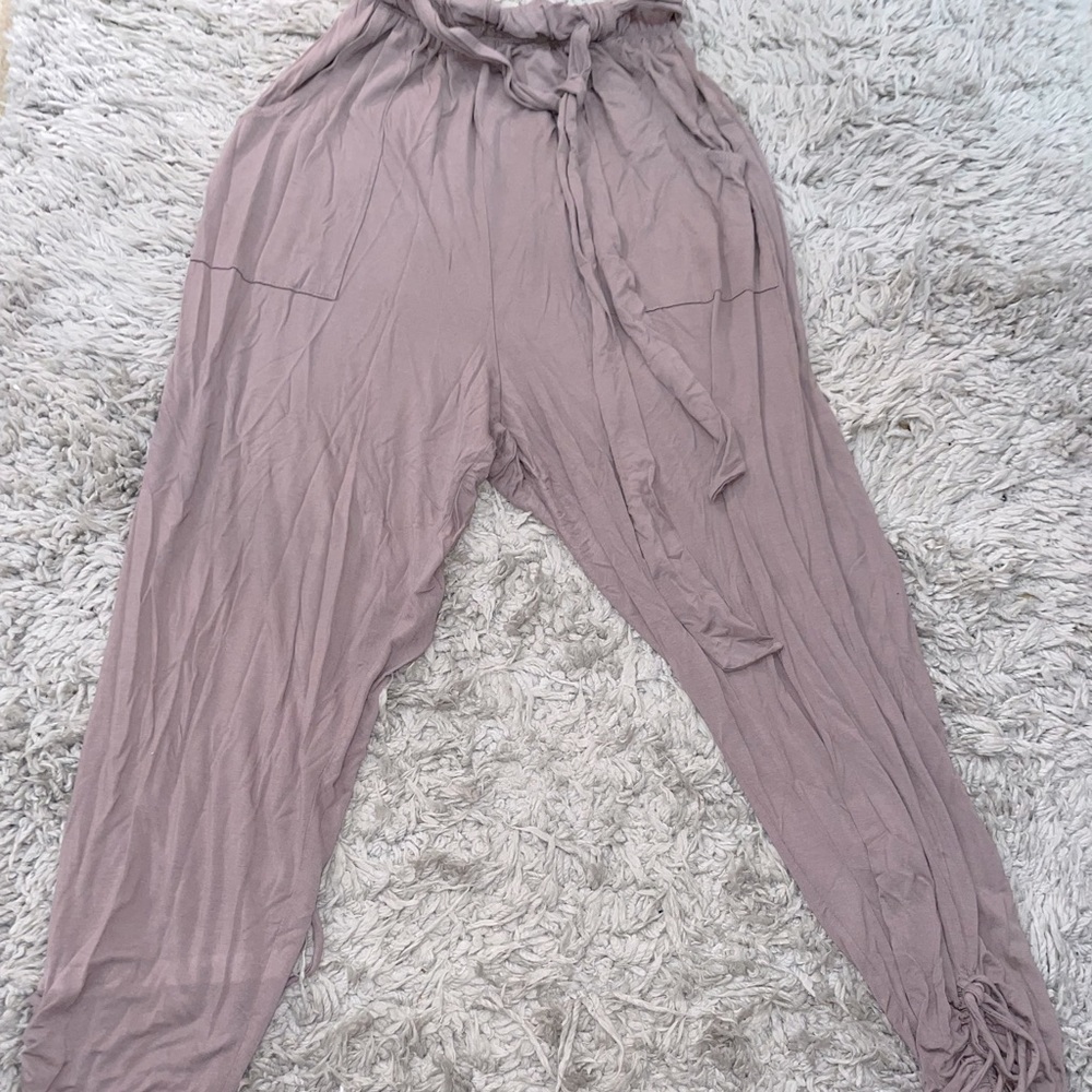Grey slouchy pants , dress it up or comfy down . Super comfy and flattering